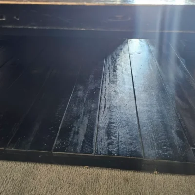 A Black Reclaimed Wood Coffee Table